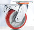 Roulettes résistantes de 6 pouces avec les roues oranges de fonte de roulettes d'uréthane de freins